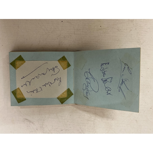 77 - A LATE 1960'S EARLY 1970'S AUTOGRAPH BOOK, CONTAINING STANLEY MATHEWS, GORDON BANKS, DENIS LAW, BOBB... 