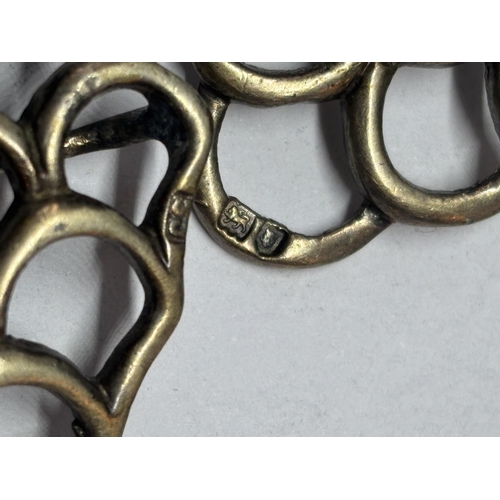 84 - A MARKED SILVER NURSES BUCKLE