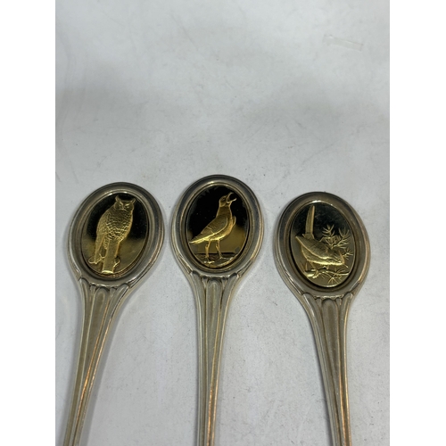 93 - A SET OF FIVE HALLMARKED LONDON SILVER BIRD DESIGN SPOONS