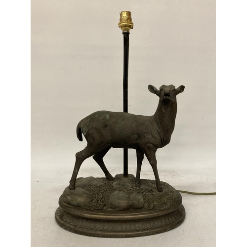 95 - A CAST METAL FIGURE OF A DEER ON A PLINTH TABLE LAMP - A/F, ANTLERS MISSING, HEIGHT TO THE TOP OF TH... 