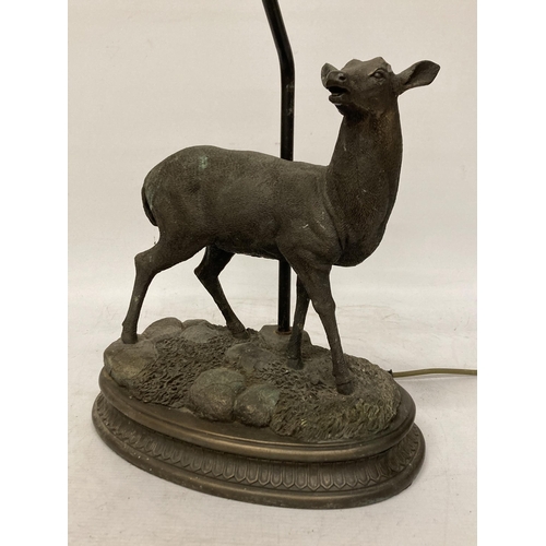 95 - A CAST METAL FIGURE OF A DEER ON A PLINTH TABLE LAMP - A/F, ANTLERS MISSING, HEIGHT TO THE TOP OF TH... 