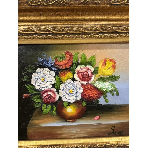 20 - AN OIL ON BOARD STILL LIFE PAINTING OF A VASE OF FLOWERS IN A GILT FRAME, SIGNED ON AN EASEL, 30CM X... 