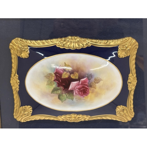 22 - A VINTAGE CARLTON WARE CERAMIC FLORAL PLAQUE, SIGNED M WOODHOUSE IN A GILT FRAME, 36CM X 30CM