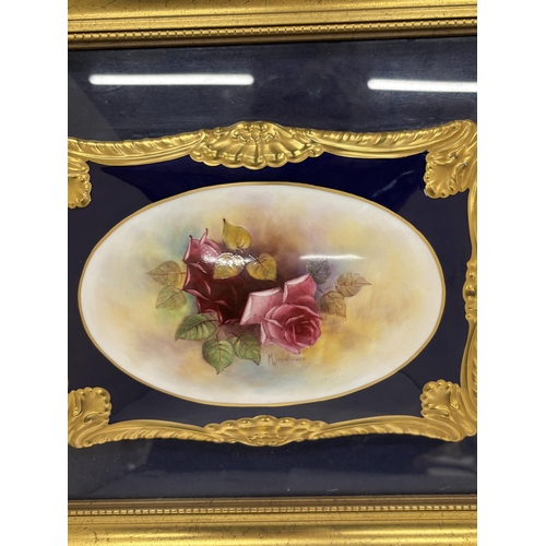 22 - A VINTAGE CARLTON WARE CERAMIC FLORAL PLAQUE, SIGNED M WOODHOUSE IN A GILT FRAME, 36CM X 30CM