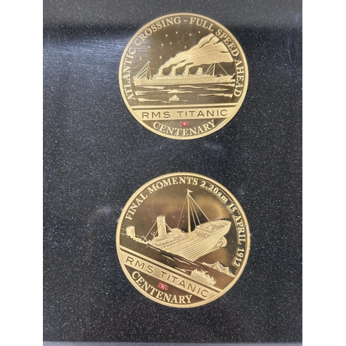 24 - A SET OF FOUR WESTMINSTER RMS TITANIC CENTENARY COINS