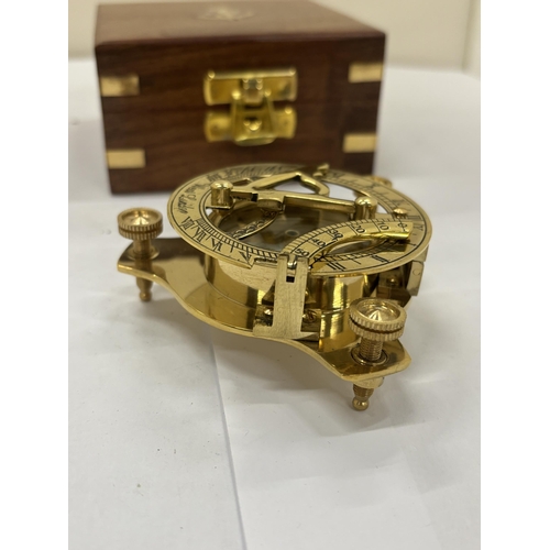 28 - A BOXED BRASS SUNDIAL COMPASS