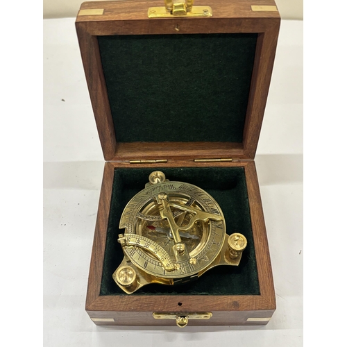 28 - A BOXED BRASS SUNDIAL COMPASS