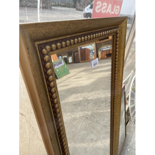 3033 - A GILT FRAMED WALL MIRROR WITH BEVEL EDGE, 52.5