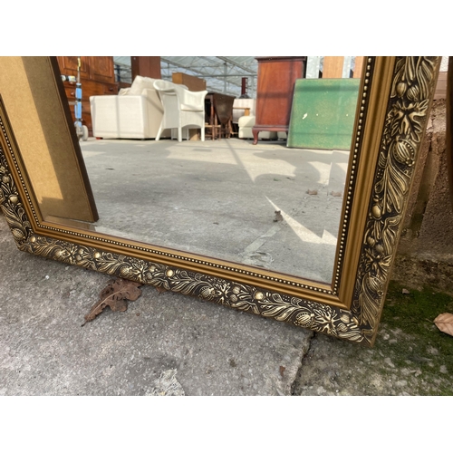 3038 - A GILT FRAMED BEVEL EDGE WALL MIRROR, 34