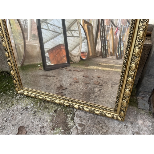 3043 - A GILT FRAMED BEVEL EDGE WALL MIRROR, 29