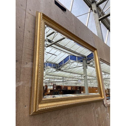 3053 - A GILT FRAMED BEVEL EDGE WALL MIRROR, 41