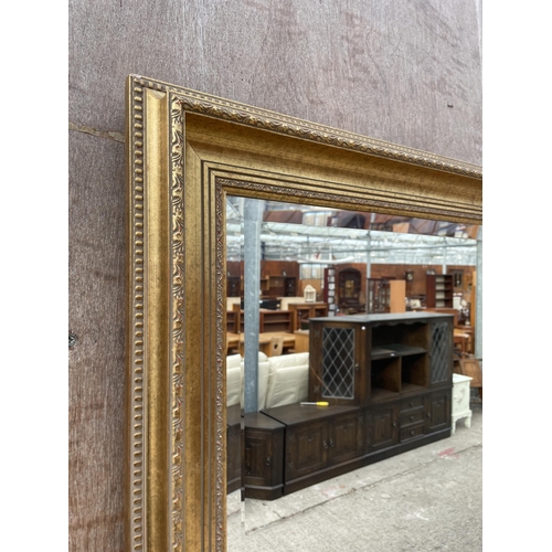 3053 - A GILT FRAMED BEVEL EDGE WALL MIRROR, 41