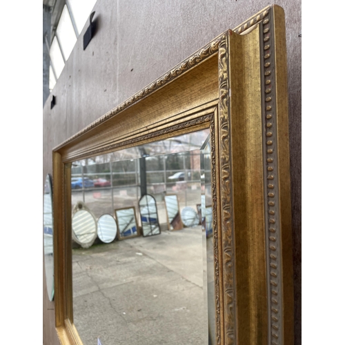 3053 - A GILT FRAMED BEVEL EDGE WALL MIRROR, 41