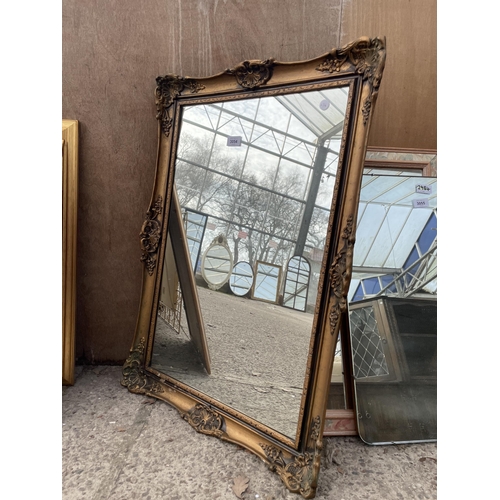 3054 - A GILT FRAMED WALL MIRROR, 31