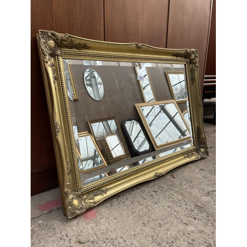 3058 - A GILT FRAMED BEVEL EDGE WALL MIRROR, 36