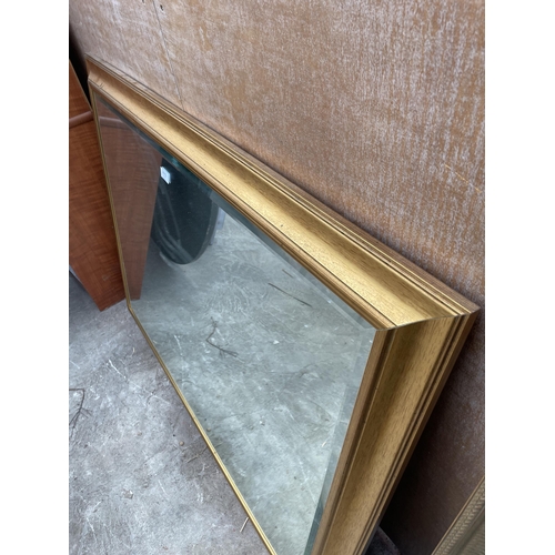 3075 - A GILT FRAMED BEVEL EDGE WALL MIRROR, 48