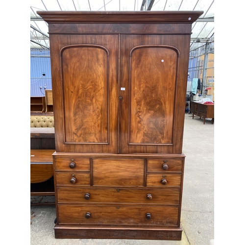 2828 - A VICTORIAN MAHOGANY TWO DOOR LINEN PRESS WITH FOUR SLIDES AND SEVEN DRAWERS TO BASE, 55.5" WIDE