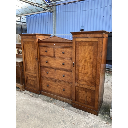 3121 - A VICTORIAN OAK COMPACTUM WARDROBE WITH TWO HANGING COMPARTMENTS, TWO SHORT AND THREE LONG DRAWERS, ... 