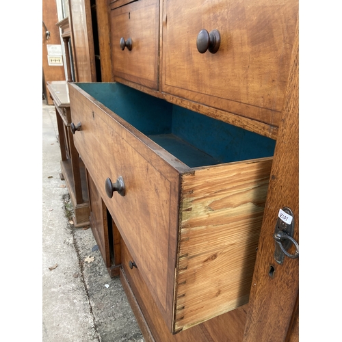 3121 - A VICTORIAN OAK COMPACTUM WARDROBE WITH TWO HANGING COMPARTMENTS, TWO SHORT AND THREE LONG DRAWERS, ... 