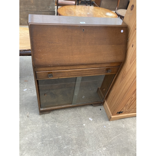 3162 - A MID 20TH CENTURY OAK BUREAU 29.5