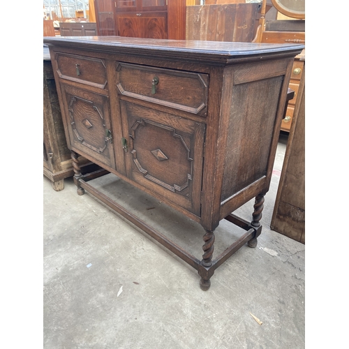 3164 - AN EARLY 20TH CENTURY OAK SIDEBOARD ON BARLEY TWIST LEGS 48