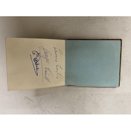 77 - A LATE 1960'S EARLY 1970'S AUTOGRAPH BOOK, CONTAINING STANLEY MATHEWS, GORDON BANKS, DENIS LAW, BOBB... 