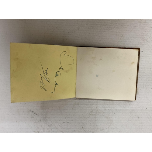 77 - A LATE 1960'S EARLY 1970'S AUTOGRAPH BOOK, CONTAINING STANLEY MATHEWS, GORDON BANKS, DENIS LAW, BOBB... 