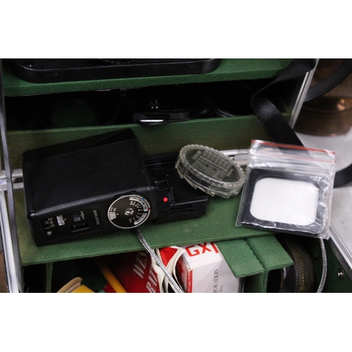 228 - A CASE CONTAINING NUMEROUS CAMERA FILTERS, A SUNAGOR SUPER WIDE CAMERA LENS AND A VIVITAR LENS TOGET... 