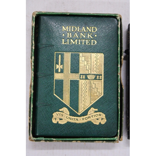 257 - A PAIR OF VINTAGE MIDLAND BANK SAVINGS ACCOUNT BOOK MONEY BOXES, ONE IN ORIGINAL BOX