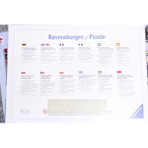 418 - THREE RAVENSBURGER 'FROZEN' JIGSAWS