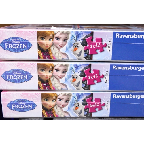 418 - THREE RAVENSBURGER 'FROZEN' JIGSAWS