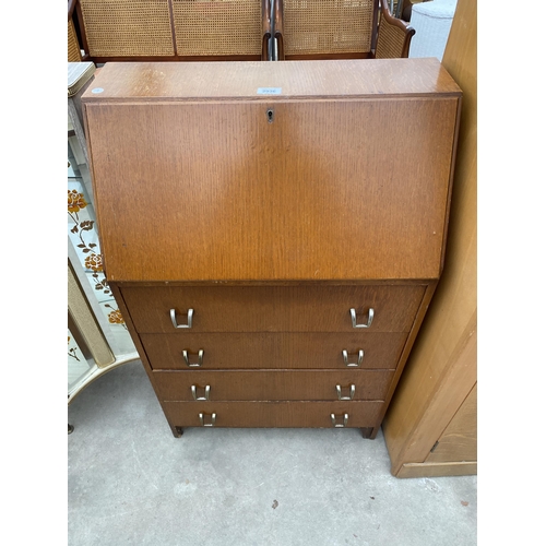 2936 - A MID 20TH CENTURY OAK BUREAU WITH FOUR DRAWERS TO BASE, 24