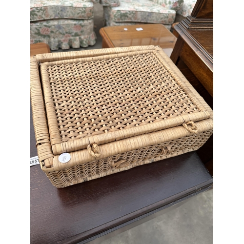 2957 - AN OAK TWO TIER DROP-LEAF TROLLEY AND WICKER BASKET