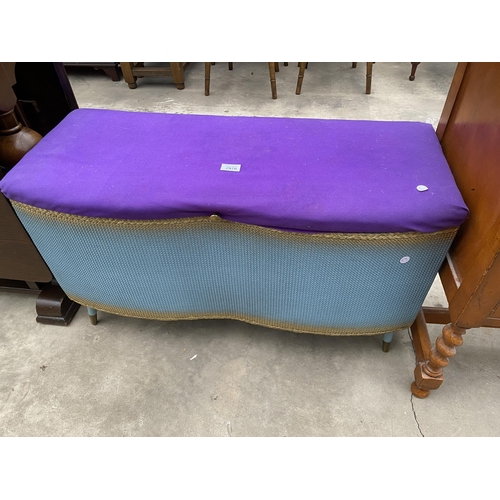 2970 - A LLOYD LOOM STYLE OTTOMAN