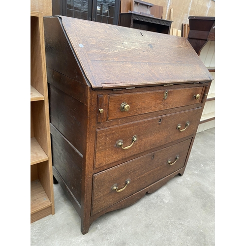 2973 - AN OAK GEORGE III BUREAU WITH FITTED INTERIOR AND THREE DRAWERS TO BASE, 37