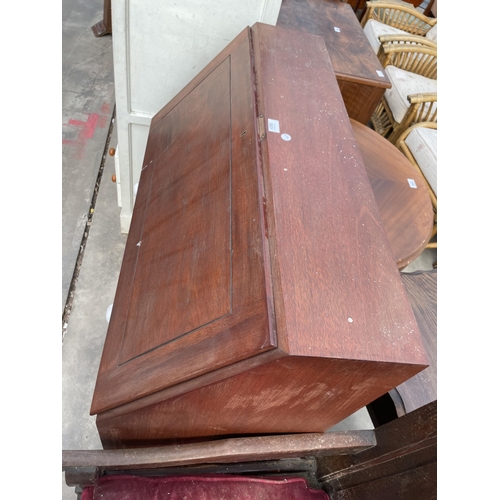 3021 - A MAHOGANY BUREAU WITH THREE DRAWERS HAVING PORCELAIN KNOBS, 36