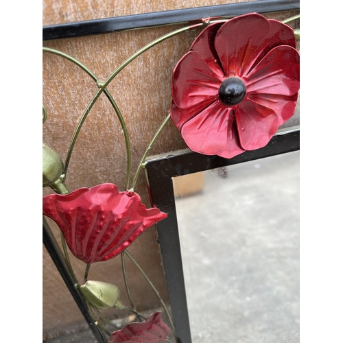 3081 - A MIRROR WITH ENAMEL STYLE METAL POPPY BORDER