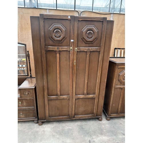 3087 - A 1950s OAK TWO DOOR WARDROBE BY W TAYLOR, HANLEY