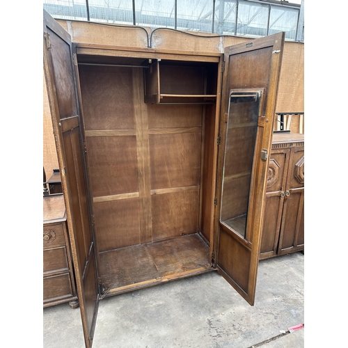 3087 - A 1950s OAK TWO DOOR WARDROBE BY W TAYLOR, HANLEY