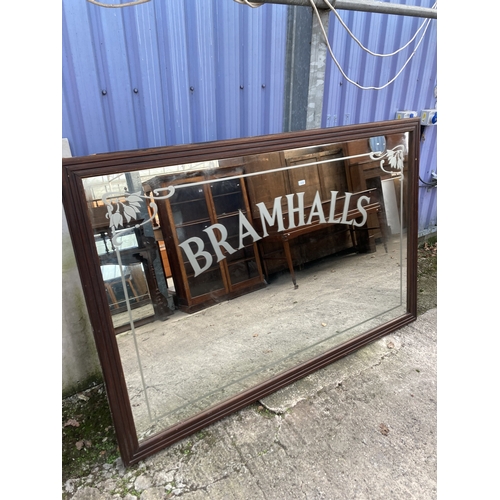 3132 - A LARGE BRAMHALLS PUB MIRROR, 84