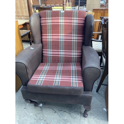 3155 - A FAUX LEATHER AND TARTAN WINGED FIRESIDE CHAIR ON CABRIOLE LEGS