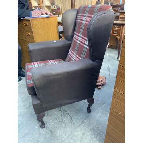 3155 - A FAUX LEATHER AND TARTAN WINGED FIRESIDE CHAIR ON CABRIOLE LEGS