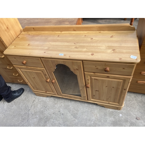 3157 - A PINE SIDEBOARD WITH GLAZED CENTRAL DOOR, 48.5