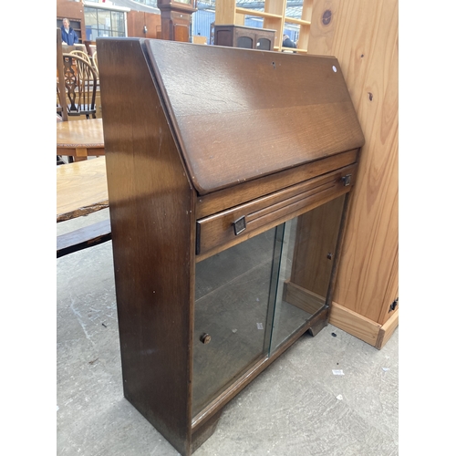 3162 - A MID 20TH CENTURY OAK BUREAU 29.5