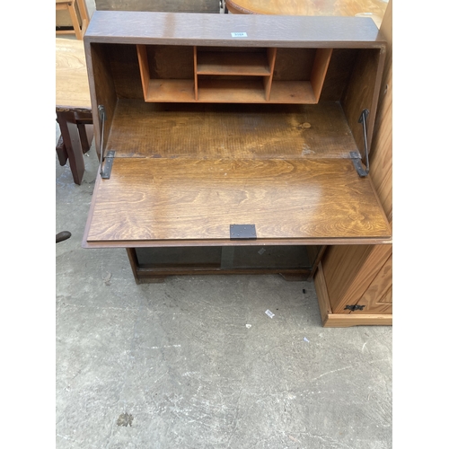 3162 - A MID 20TH CENTURY OAK BUREAU 29.5