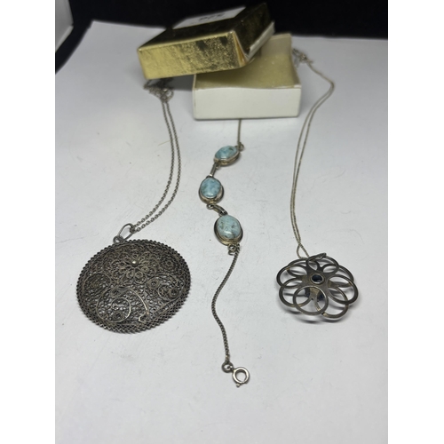  THREE MARKED SILVER AND WHITE METAL ITEMS TO INCLUDE A 925 BRACELET, AND TWO CHAINS WITH PENDANTS