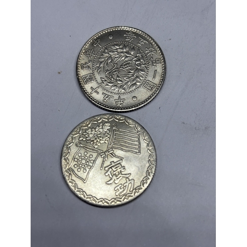  FOUR ORIENTAL SILVER COINS