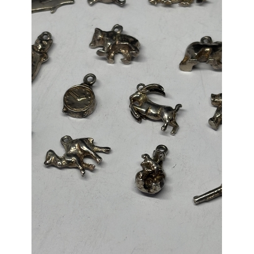  TWENTY SILVER CHARMS