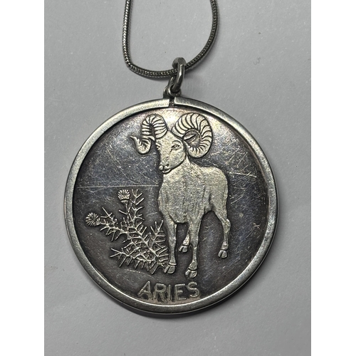  A SILVER ZODIZC ARIES PENDANT ON A CHAIN