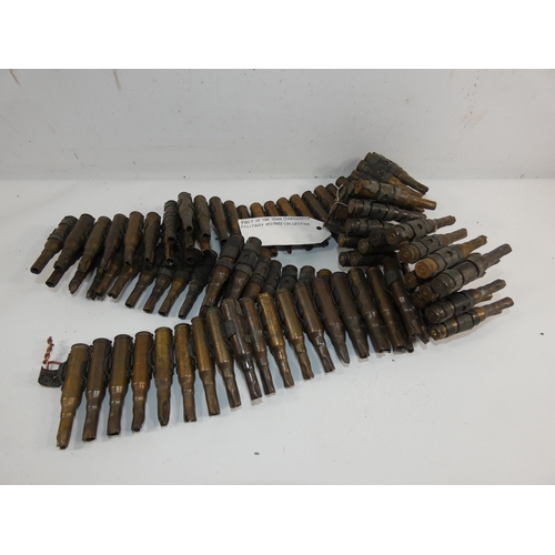 322 - A 7.62MM X 51MM FIRED BLANK BELT OF ONE HUNDRED CARTRIDGES WITH PROVENANCE